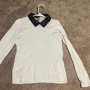 White collared sweater